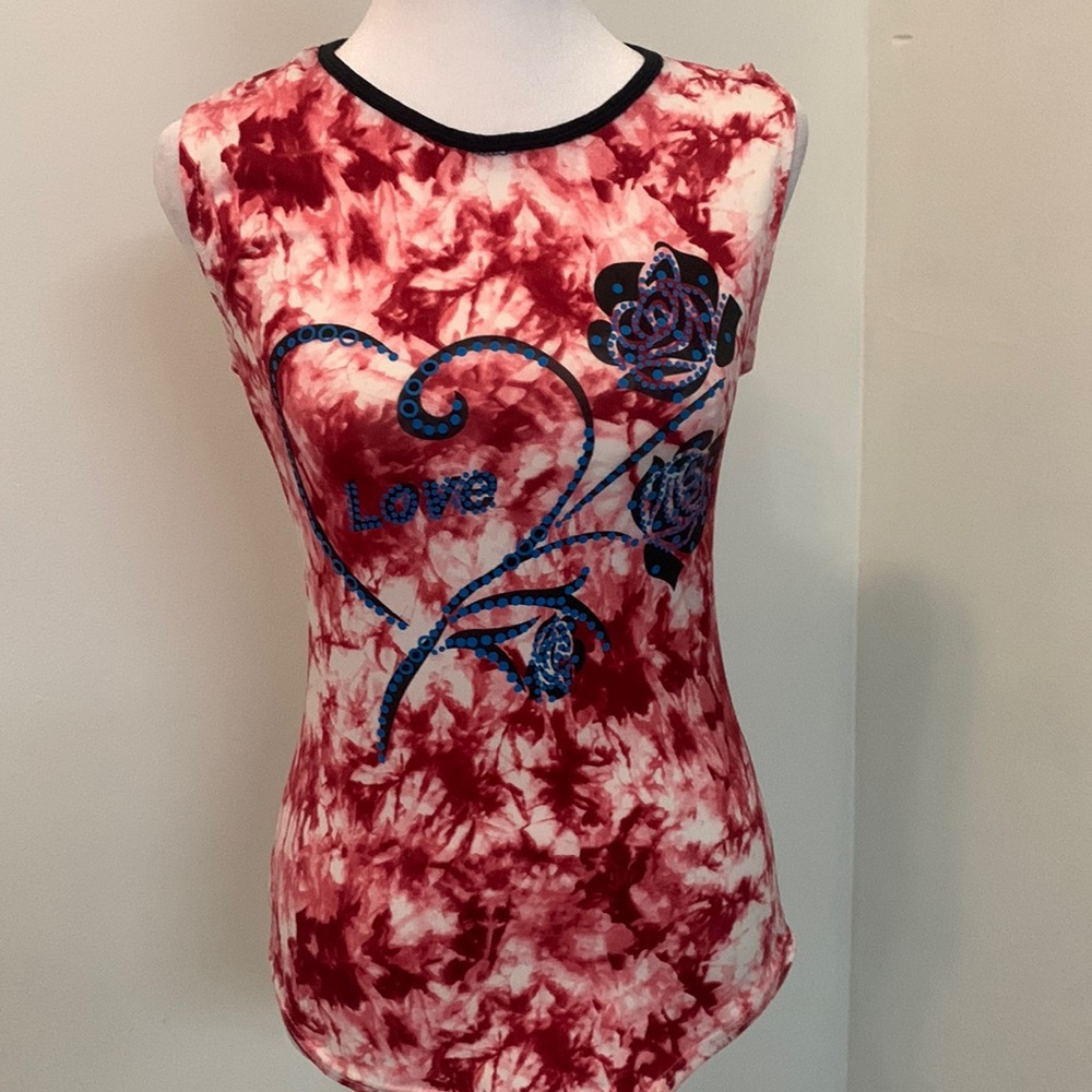 2 cute women blouse 1 tullle fabric 1 stretch fabric 2 X $ 8.00